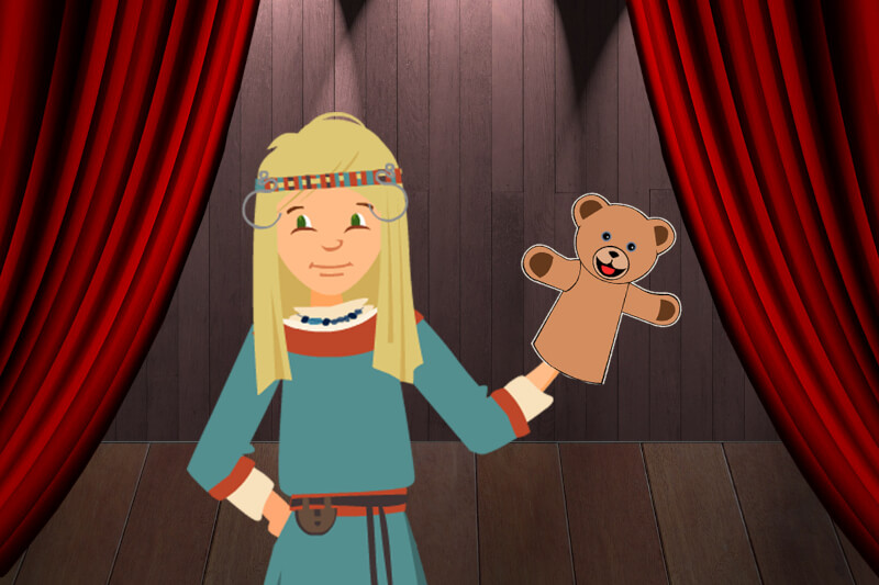 grafika rysunkowa - chłopiec w długich blond włosach, ubrany w tunikę, trzyma w lewej ręce pacynkę